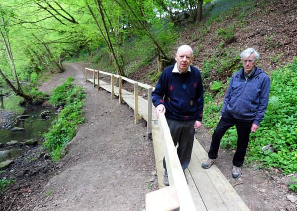 Peter Jerrome and Gordon Stevenson on the controversial bridge that has recently been put up in front of the spring