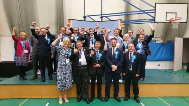 Jubilant Conservatives at the county council election count