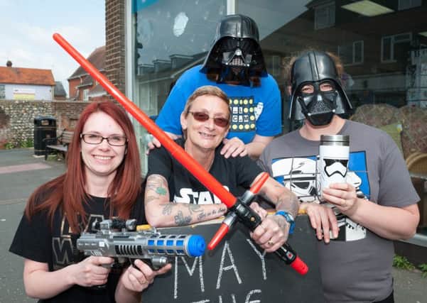 Assistant manager Jan O'Sullivan and her staff celebrating Star Wars Day. Picture: Scott Ramsey Photography