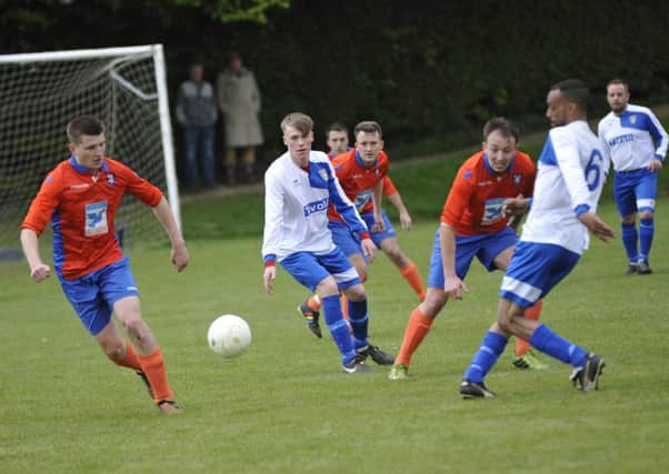 Action from Battle Baptists' 2-0 defeat at home to Sedlescombe Rangers on Monday. Picture by Simon Newstead