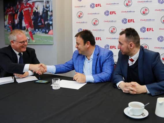 Crawley Town owner Ziya Eren, middle, with Crawley Observer sports editor Graham Carter, left and director Selim Gaygusuz, right. 
Picture by James Boardman