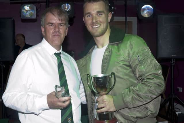 Dan Lincoln receives the fans' player of the year trophy from David Seabourne / Picture by Tommy McMillan
