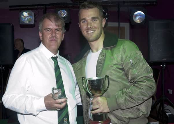 Dan Lincoln receives the fans' player of the year trophy from David Seabourne / Picture by Tommy McMillan
