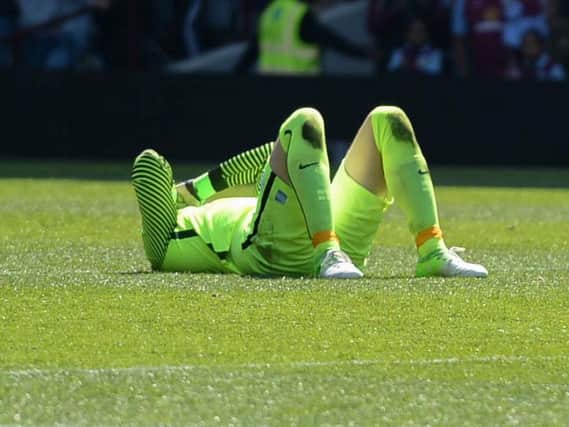 David Stockdale with head in hands at the end of Albion's draw at Aston Villa yesterday. Picture by Phil Westlake (PW Sporting Photography)