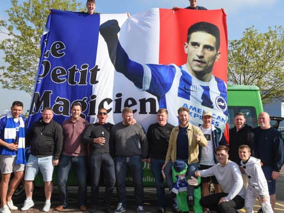 Albion fans pictured with a flag dedicated to winger Anthony Knockaert. Picture by Phil Westlake (PW Sporting Photography)
