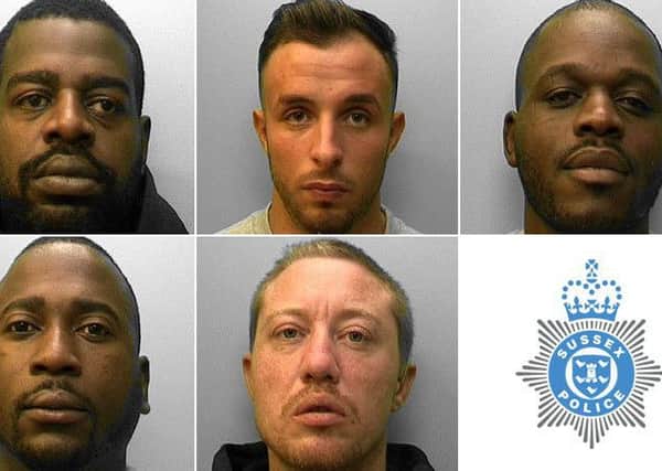 Five men have been jailed for a total of 72 years after keeping two men against their will and torturing them using a knife and an iron before leaving them in the boot of a car in Brighton.