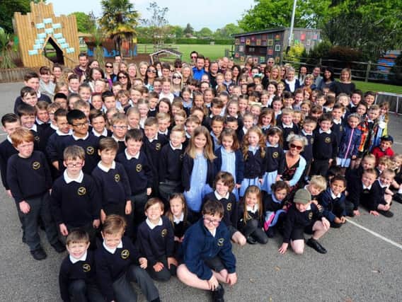 The staff and children of Aldingbourne School