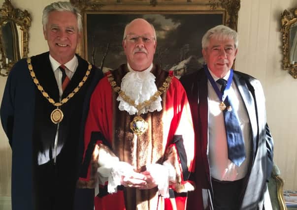 New Chichester Mayor Peter Evans (C) alongside outgoing mayor (R) Peter Budge and new deputy (L) Martyn Bell