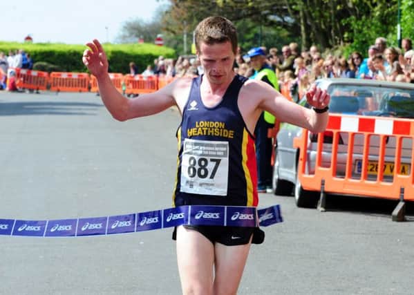 Adam Kirk-Smith wins the 2016 Bognor Prom 10k / Picture by Kate Shemilt