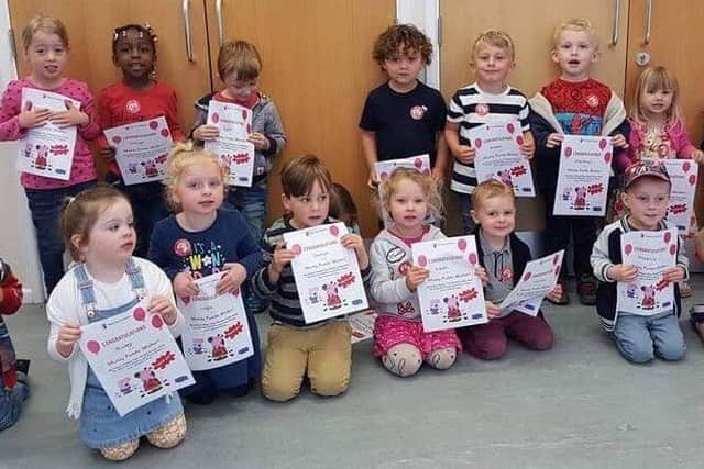 Members of Little Explorers Pre-school with their certificates