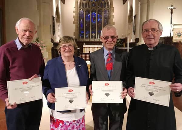 Worthing diamonds, from left, Alan Crouch, Elizabeth Clark, Peter Cronin and David Burt have clocked up more than 100 years' service for Christian Aid