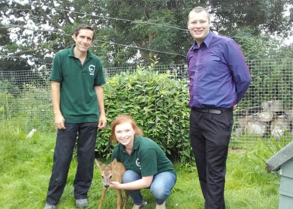 General manager Robert Knight, right, with animal care managers Darren Ashcroft and Emma Pink SUS-160107-144441003