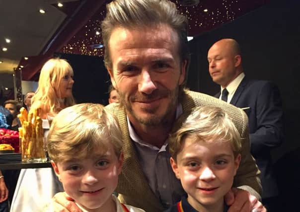 Oliver and Zac Barker, from Ashington, with David Beckham at the film premiere of King Arthur and  the Legend of the Sword SUS-171105-110604001