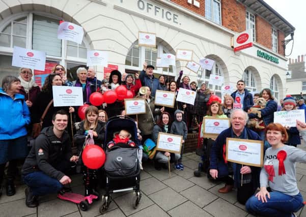 Dozens of people protested against the closure of the Post Office in March