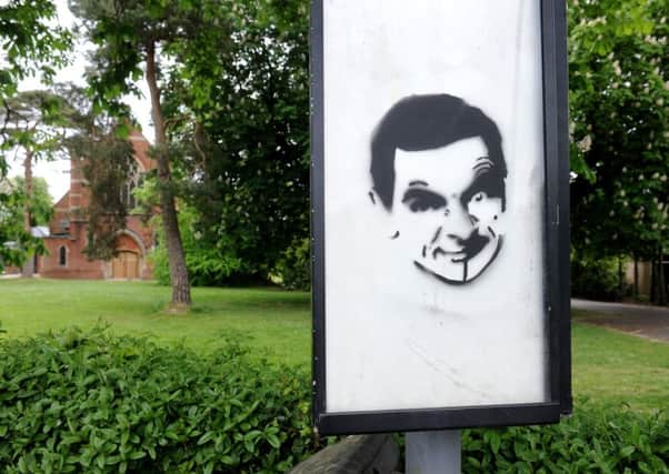 "Mr Bean" "Banksey" on a bus stop sign in Junction Road, Burgess Hill outsiide St Andrews church. Pic Steve Robards SR1709986 SUS-170905-173512001