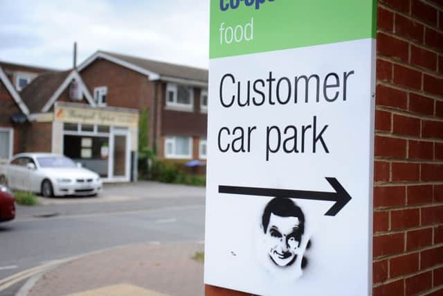"Mr Bean" "Banksey" on a bus stop sign in Junction Road, Burgess Hill outsiide St Andrews church. Pic Steve Robards SR1709994 SUS-170905-173524001