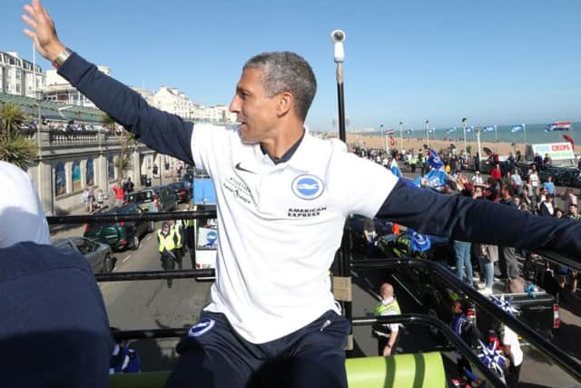 Albion boss Chris Hughton waves to fans. Picture by Paul Hazlewood (BHAFC)