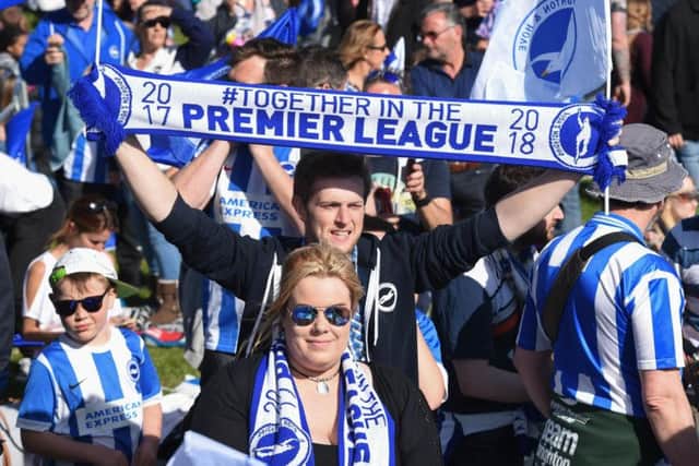 Brighton fans celebrate promotion. Picture by Phil Westlake (PW Sporting Photography)