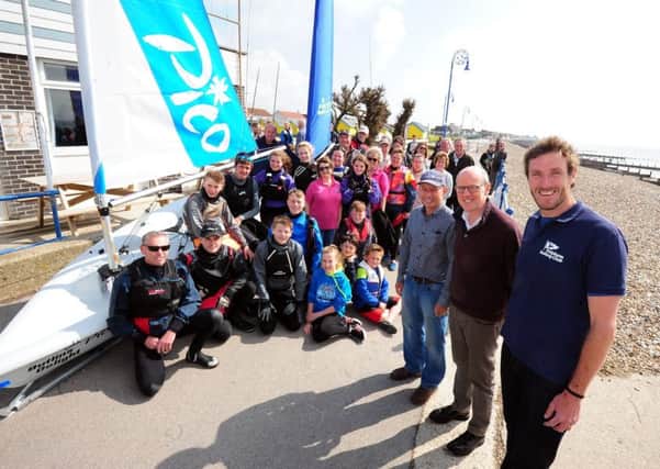 Members and supporters of Felpham Sailing Club get ready to launch the new dinghies / Picture by Kate Shemilt