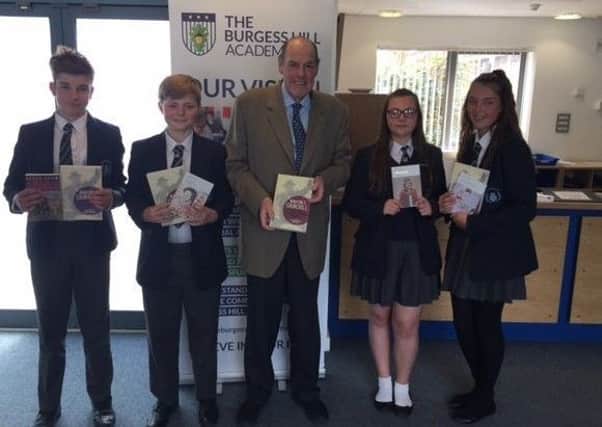 Sir Nicholas Soames donated dozens of history books to the Burgess Hill Academy SUS-170515-095309001