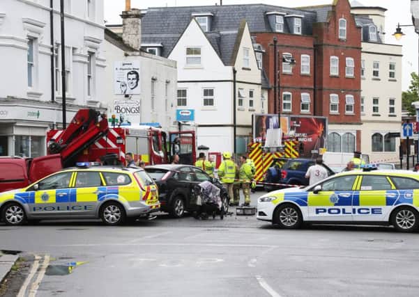 A road traffic collision involving three cars has closed Railway Approach in Worthing. Picture: Eddie Mitchell