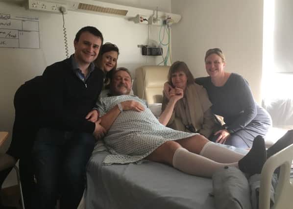 David Bedding with his family in hospital