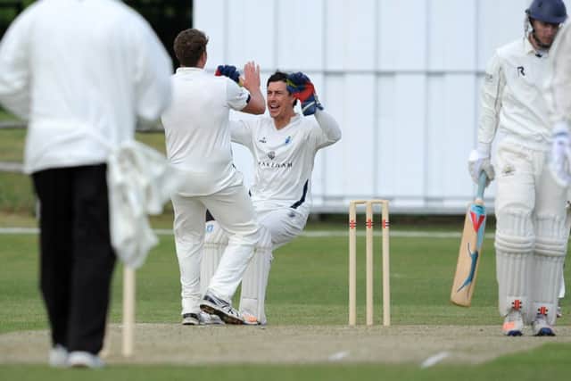Cricket: Sussex League Division 2: Billingshurst (fielding) v Porstlade. Wicket keeper Michael Burroughs celebrates the wicket of David Wainwright batting   . Pic Steve Robards SR1710764 SUS-170515-180708001