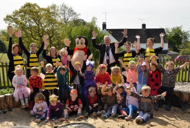 Battle Mayor David Furness and Ladybird at Battle Pre-School. Picture by Sid Saunders. SUS-170517-105930001