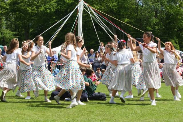 Maypole dancing by Fernhurst Primary School DM17524888a