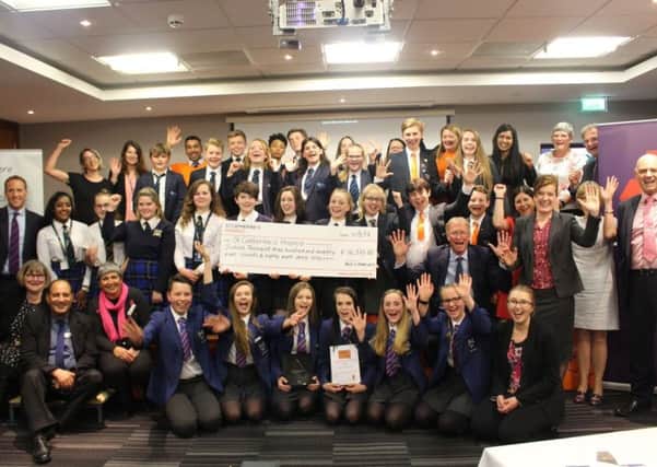 Students presenting their ideas and with their awards at the Five-O Project award night at the Holiday Inn, Gatwick. Picture: St Catherine's Hospice