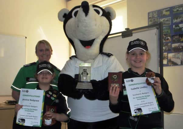 Southwick Badgers Jessica Redgrave and Isabelle Lindley with Jo Gardner, regional youth development manager, and mascot Bertie the Badger