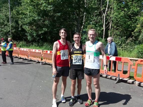 Bognor Prom 10k race winner James Westlake (centre), runner-up Matt Bradford (left) and third-placed finisher James Baker (right)