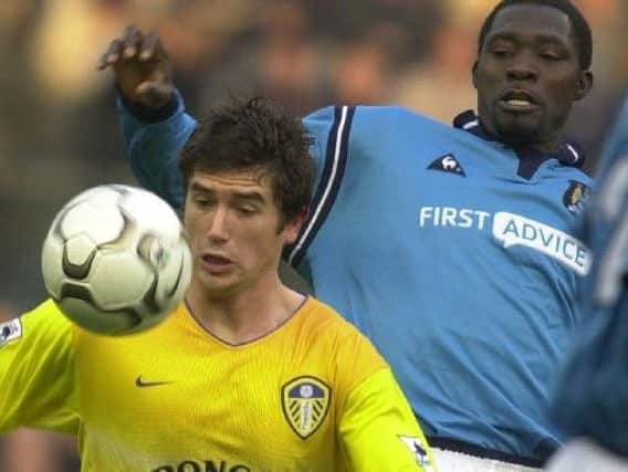 Harry Kewell is expected to be announced as the next Crawley Town manager.
This picture shows him beating Marc-Vivien Foe to the ball  Manchester City v Leeds Utd. 11 Jan 2003. Picture by Tony Johnson