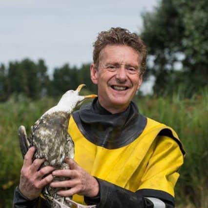 Animal rescue officer Billy Elliot with a seagull