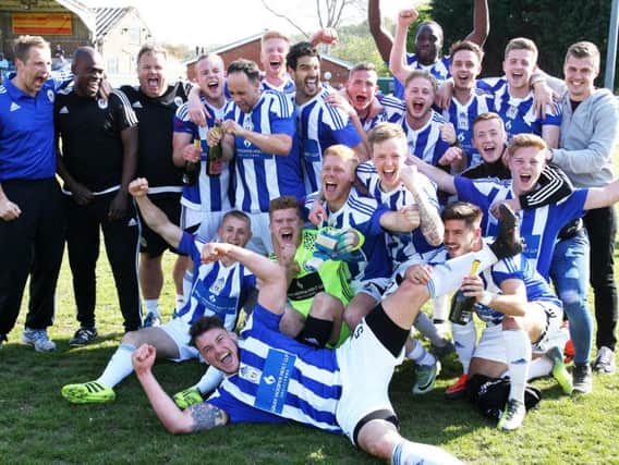 Haywards Heath Town celebrate after their win on the last day of the season.