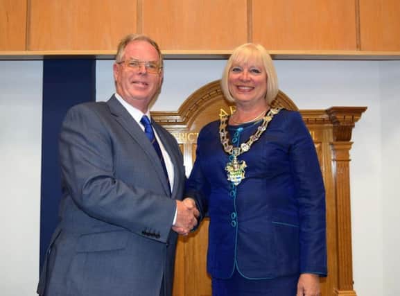 Outgoing Arun chairman Stephen Haymes hands over to councillor Jacky Pendleton SUS-170522-115033001