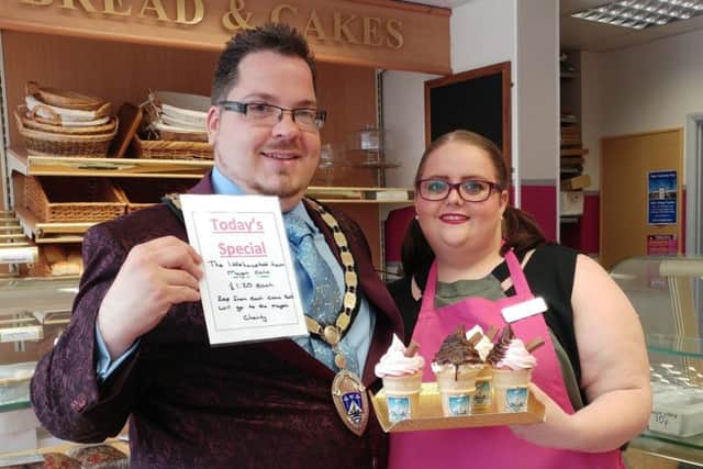 Billy with Sarah Biggs, from Biggs Bakery, and some of the special cakes