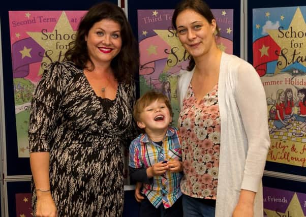 Kelly at the school with Burgess Hill parent Natasha Penney and her son. Picture: Tim Osborne Photography
