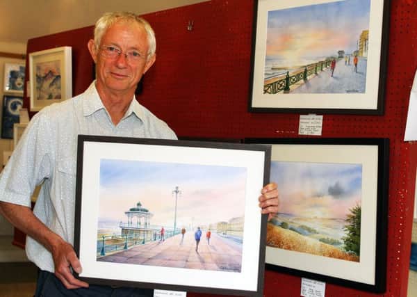 Malcolm Rogers Memorial Shield winner Clifford Feeney with some of his paintings. Picture: Derek Martin DM17525574a