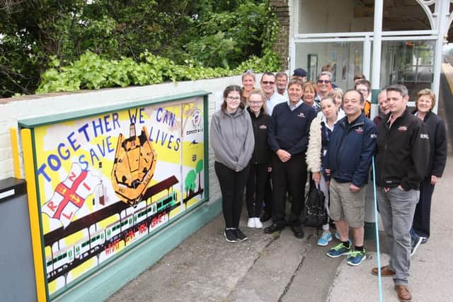 Volunteers from Shoreham Harbour Lifeboat Station with some of the students DM17525291a