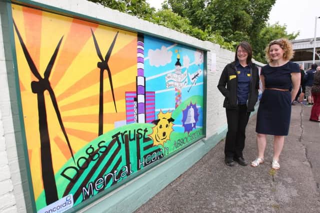 Fiona Callender from Concordia with Tracey Rae, rehoming centre manager at Dogs Trust Shoreham DM17525285a