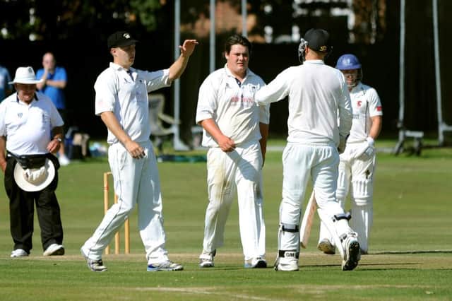Sussex League Premier Division: Roffey v Horsham (batting).  Ben Manenti (bowling) is congratulated. Pic Steve Robards SR1520397 SUS-150824-114936001