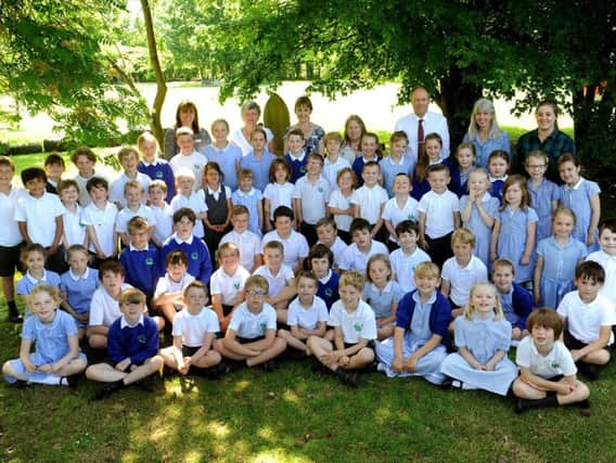 Staff and children of Amberley First School