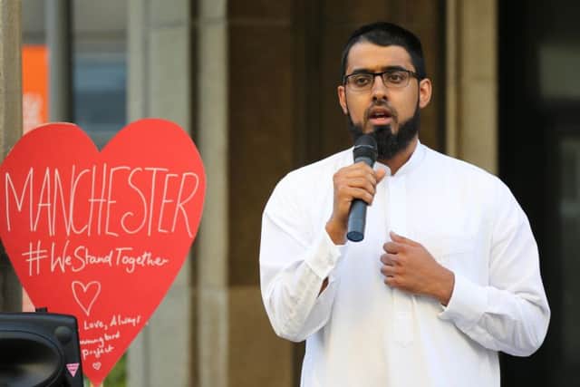 Imam Uthman speaks at The Hummingbird Project's vigil outside Brighton Town Hall (Photograph: Eddie Mitchell) SUS-170525-085038001