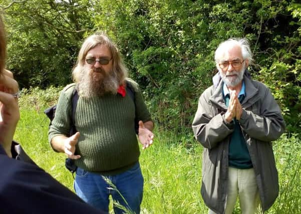 Richard Williamson, right, and Ian Powell talking to the group about wild mammals
