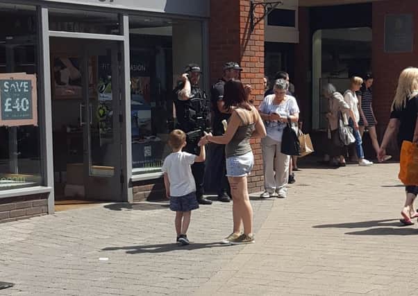Armed police in Horsham town centre SUS-170525-123749001