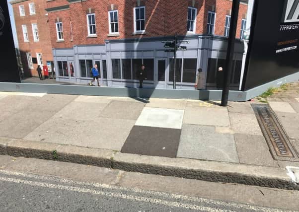 The paving has now been repaired in Northgate