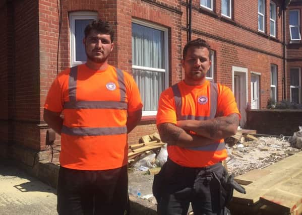 Bradley King, 23, (left) and Louie Daly, 27, carpenters of Bear Walter Construction, had been working on a roof in Salisbury Road when armed police came in and cordoned off the road after reports of weapons in a house SUS-170525-154730001