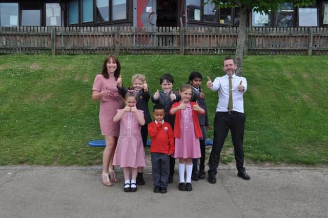 Pupils and staff at Ark Little Ridge Primary Academy SUS-170525-163018001