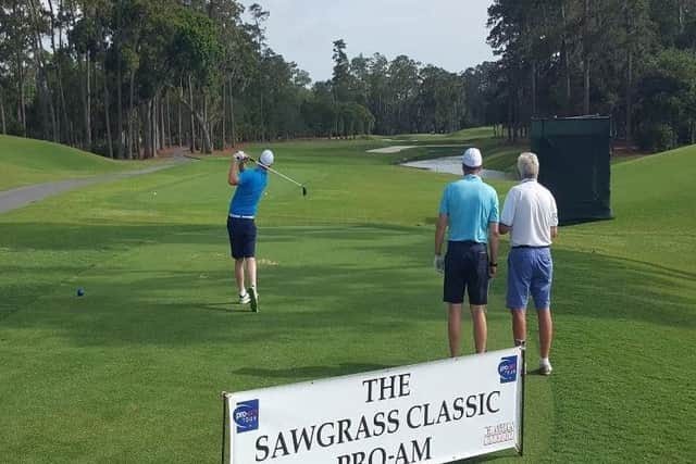 Paul Nessling tees off on the first hole at TPC Sawgrass.